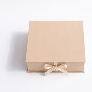 Closed champagne gift box with a ribbon bow seen from the front