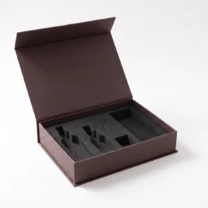 Empty black EVA foam insert with bottle-shaped cut-outs