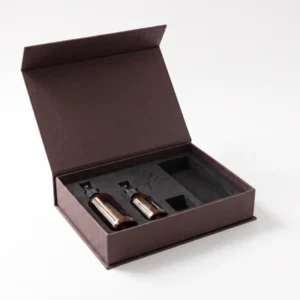 Espresso brown box with the lid open showing bottles in the black EVA insert