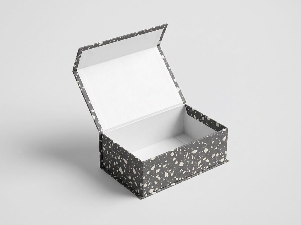 Hinged lid rigid box with charcoal terrazzo pattern, lid open
