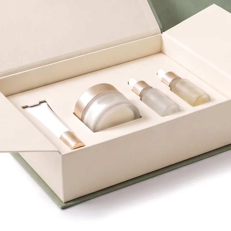 Close-up of the ivory insert holding a cream jar, a tube and serum bottles